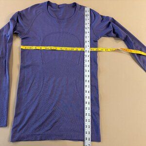 Lululemon purple sleeve stretch top in size 6
